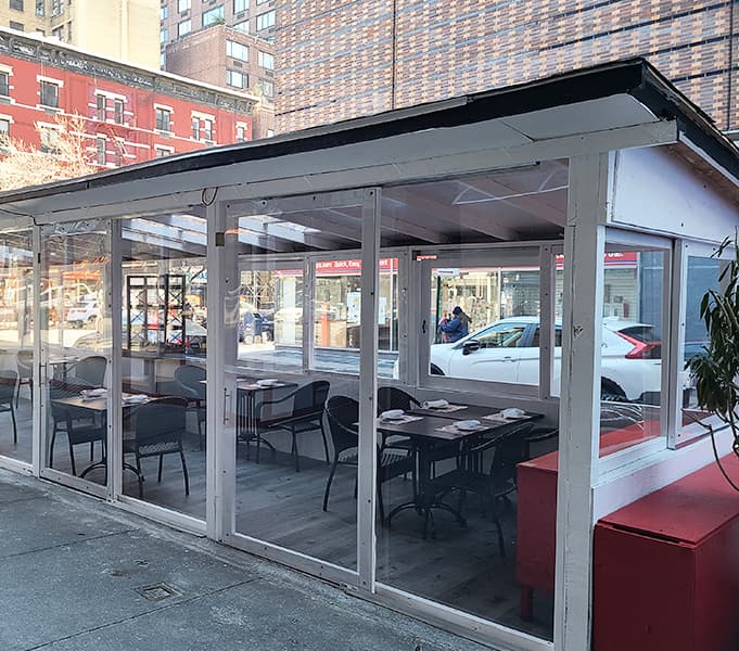 Il Violino outdoor seating front view by Vantage Brick
