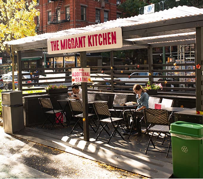 The Migrant Kitchen outdoor seating by Vantage Brick